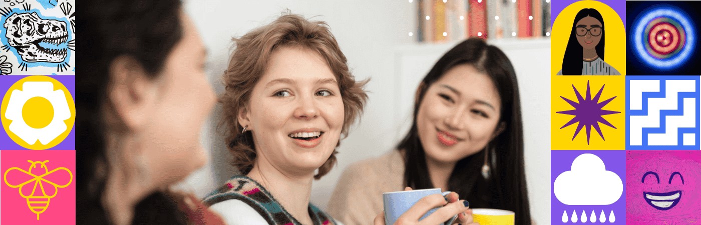 Three students chatting with cups of tea in their accommodation